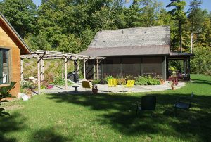 Transition from your house to your patio with a screen porch