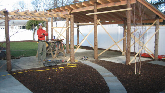 Build: Christain building the framework for the pergola and outdoor structure