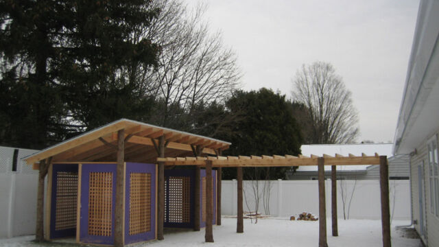 After: Winter scene of completed pergola and outdoor structure