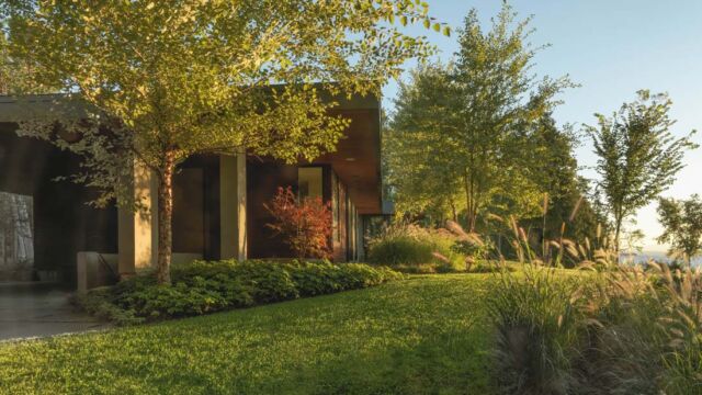 After: View of breezeway and grass connection from house to Lake Champlain