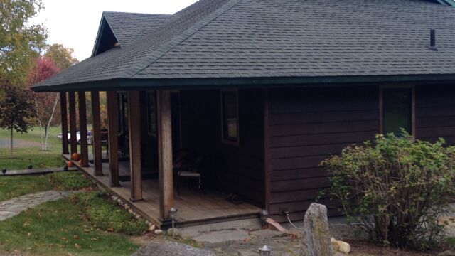 Before: Front porch with walkways leading to front door