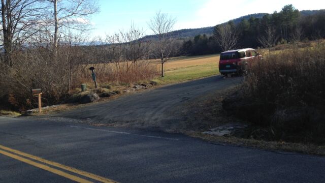 Before: Entrance to driveway from the main road.