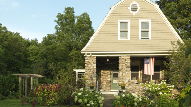 After: Annabelle Hydrangea's and a collection of classic annuals create a welcoming entrance.
